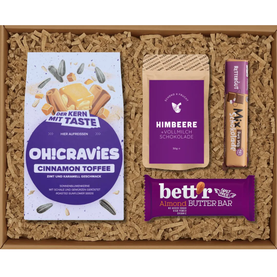 Geschenkbox mit OH!CRAVIES Cinnamon Toffee, Himbeer-Schokolade, Mix Schokolade und better Butter Riegel.