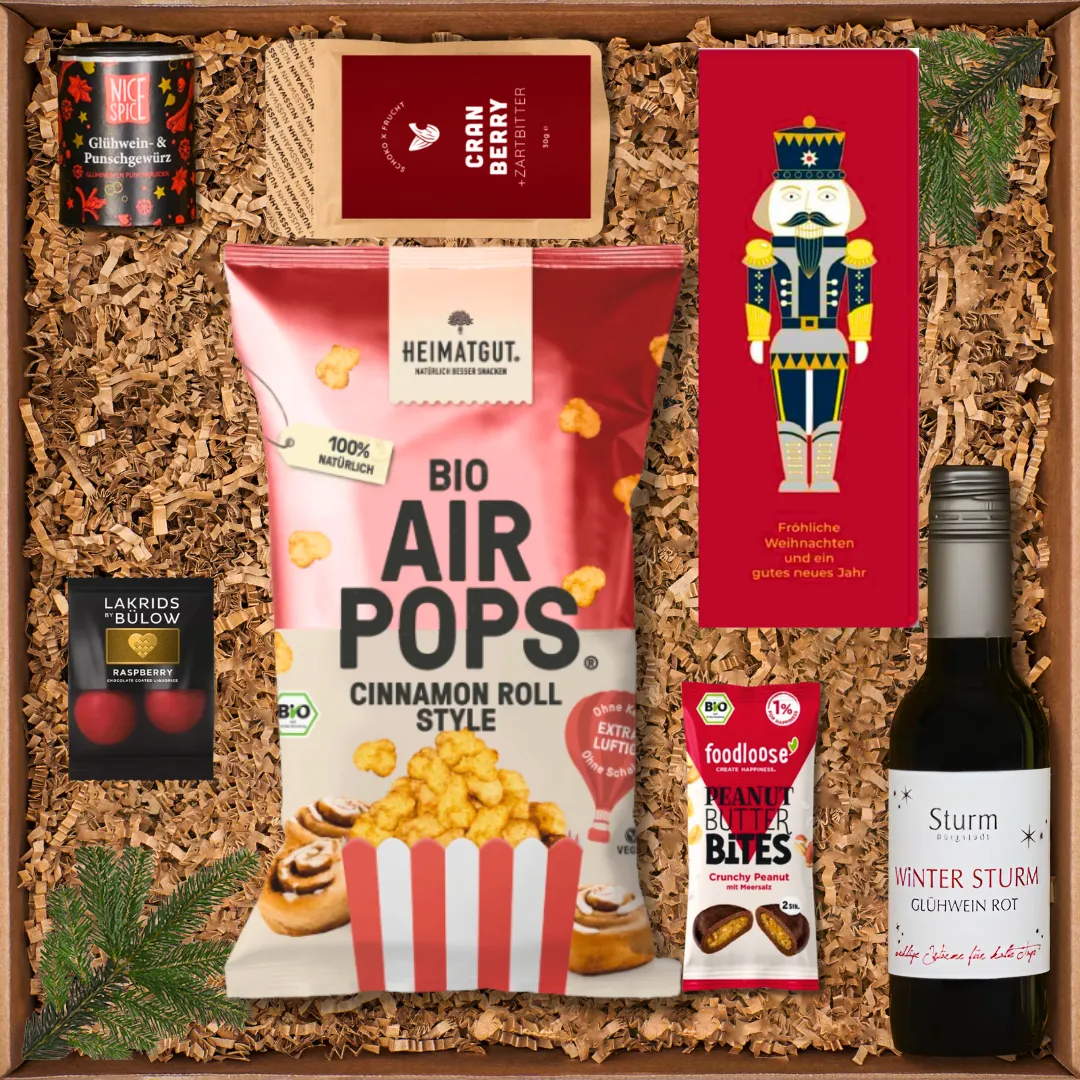 Geschenkset mit Bio-Zimt Air Pops, Glühwein-Gewürz, Lakritz, Nussbutter, Cranberry-Schokolade und Mini-Glühwein.